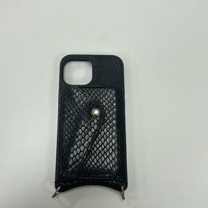Black iPhone 13 mini case
The logo is rubbed off  and the chain is tarnished￼